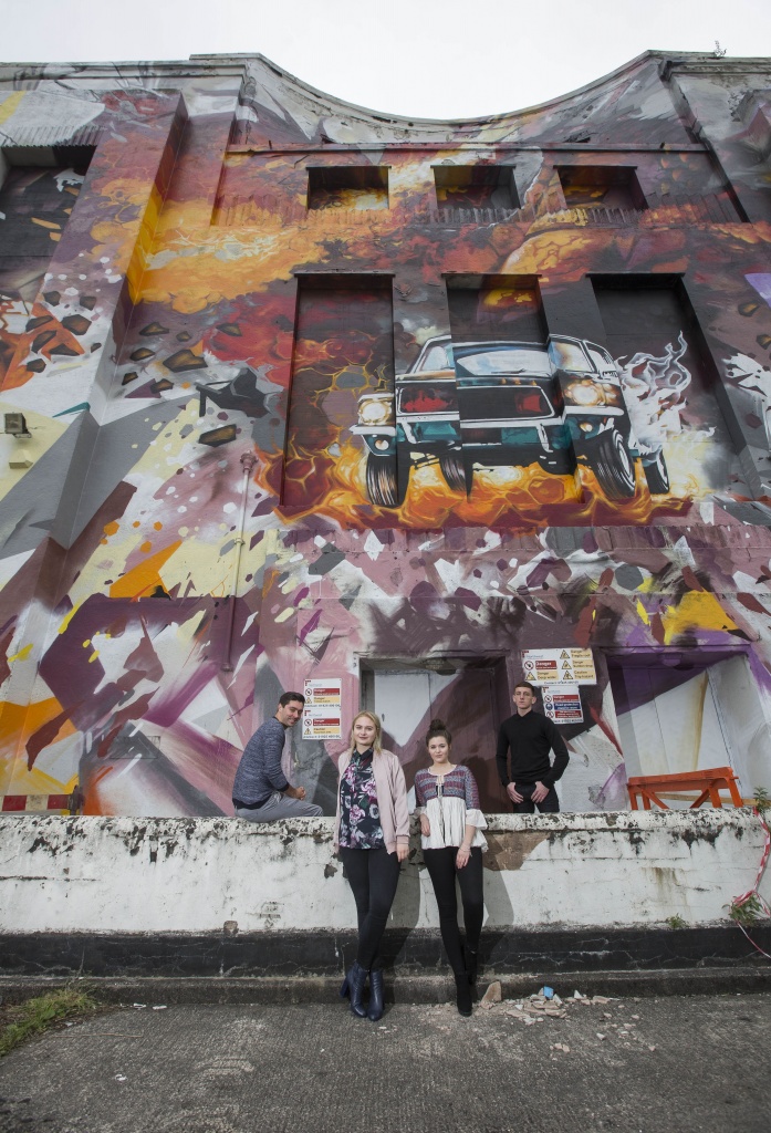 EDITORIAL USE ONLY A giant piece of street art featuring Leon Rossiter, Lapsley, Katherine Rose Morley and Louis Berry and the cult game WipeOut is painted outside the Littlewoods building in Liverpool by Local artists Replete and Beta, who created the artwork as part of the UKÕs biggest Multi-City street art project, commissioned by ÔGet it Right from a Genuine SiteÕ. PRESS ASSOCIATION Photo. Picture date: Wednesday 25 May 2016. The Liverpool activity is the last in a series of four projects commissioned by the initiative, which is working to promote increased awareness and respect of the value of the UKÕs creative industries, the previous artworks were unveiled in Bournemouth, Cardiff and Birmingham. Photo credit should read: Fabio DePaola/PA Wire